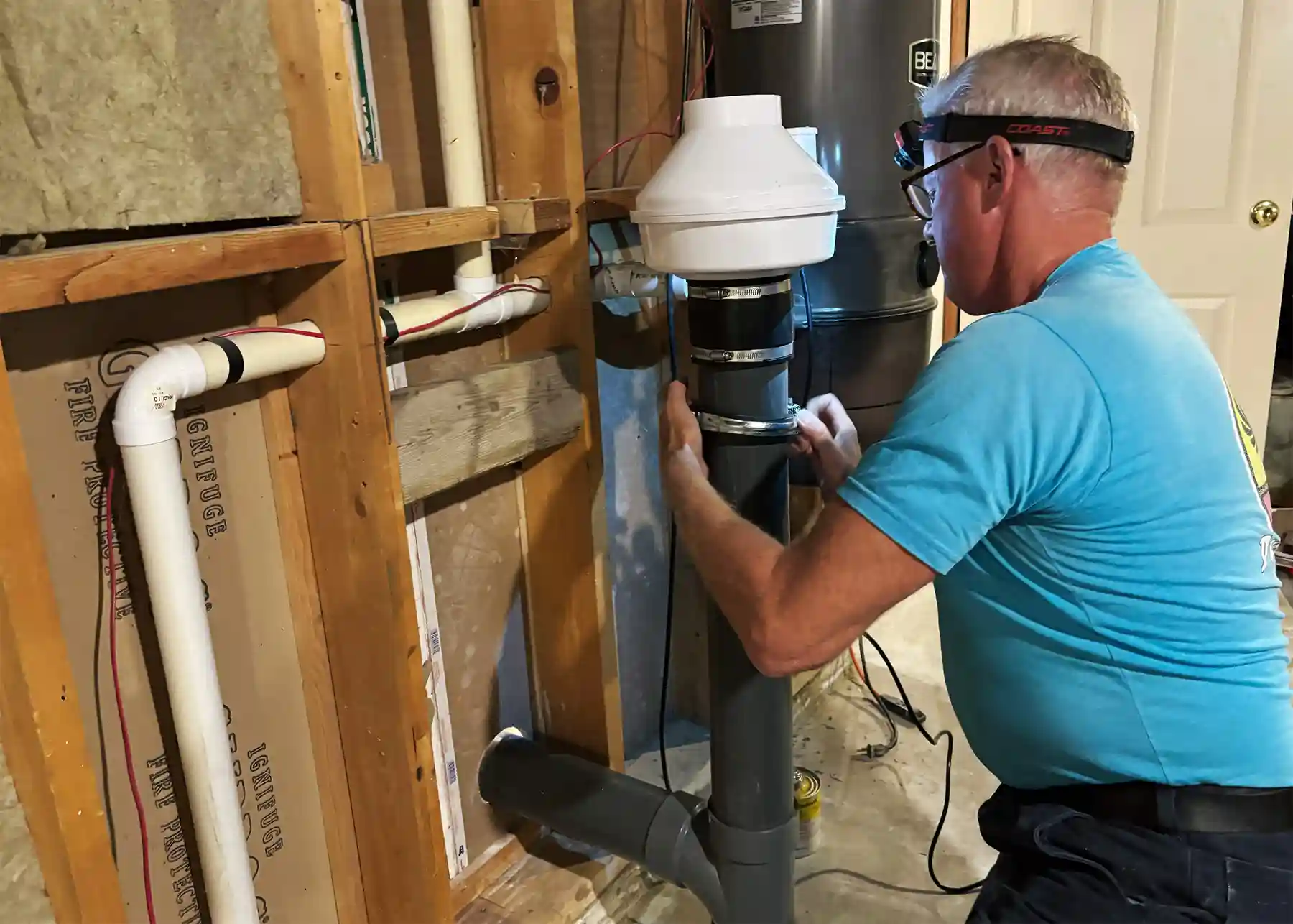 Greg Wheaton Radon Specialist installing Radon venting fan.
